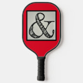 アンパユーモアのあるサンド記号と赤で始まる ピックルボールラケット (裏面)
