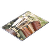 アーチェリー弓、矢と震え ノートブック (左側)