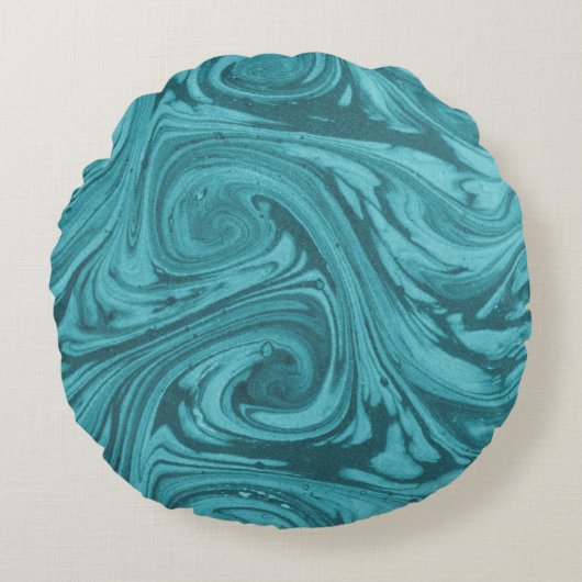 アーチ型の曲線の背景にターコイズの色調が ラウンドクッション (正面)