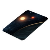 アーティストのコンセプトKepler-16b. マグネット (左側)