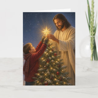 イエス様が少年を助けてクリスマスツリーを飾る シーズンカード
