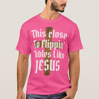 イエス様のようなフリッピンのテーブルに近い Tシャツ