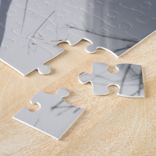 イエローストーンの雪の斜面で草を食むオスの鹿 ジグソーパズル (側面)