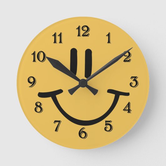 イエローハッピー顔 ラウンド壁時計 (正面)