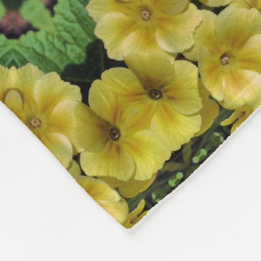 イエロープリムローズフラワー万華鏡のように千変万化するパターンアート フリースブランケット (角)