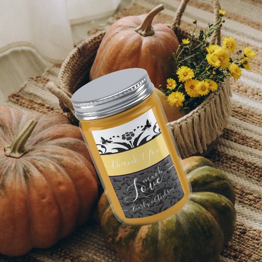 イエロー、ブラック、グレーののまわりにフローラダマスク ラベル