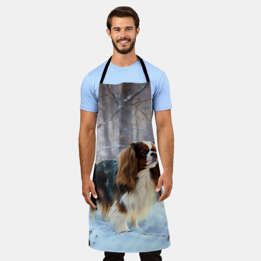 イギリスのおもちゃスパニエル犬が雪のクリスマスを過ごす エプロン (着用した状態)