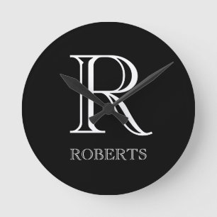 イニシャルおよび姓のパーソナライズな時計 ラウンド壁時計