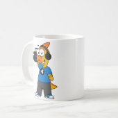 イラストレーションのカメラ操作者。 コーヒーマグカップ (正面左)