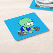 イラストレーションのTriceratopsの重量を持ち上げる。 スクエアペーパーコースター (アングル)