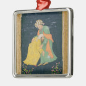 イランの服の人に曲がっているムラー メタルオーナメント (左)