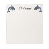 イルカがダークブルーを飛び跳ねるかわいい2匹の輝き ノートパッド (正面)