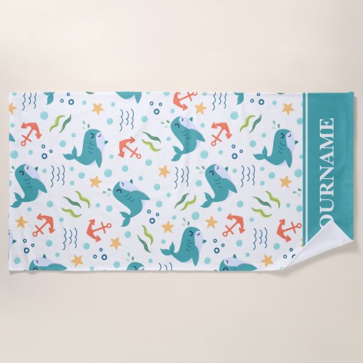 イルカといかりのティール（緑がかった色）と海の下の白 ビーチタオル (正面)