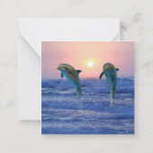 イルカの日の出でビーチ結婚式ありがとう ノートカード (裏面)
