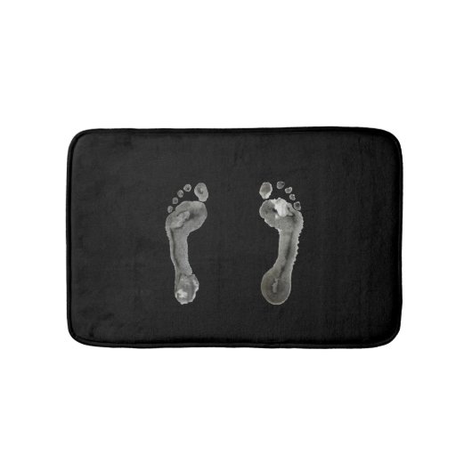 インクをしみ込ませられた足跡(黒) バスマット (正面)