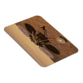 インサイト着陸装置が火星の表面で動作。 マグネット (右側)