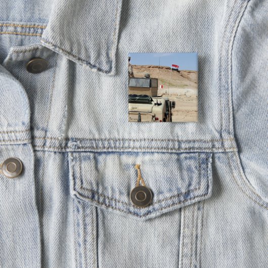 インストラクターがイラクの軍人の姿を見る 缶バッジ (インサイチュ)