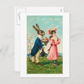 イースターでウサギが女性を求愛 シーズンポストカード (正面/裏面)