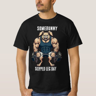 イースターにジムで脚トレをサボった兎がいるらしい ファニーピグメントTシャツ Tシャツ