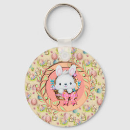 イースターのかわいいウサギがバスケットに座って キーホルダー