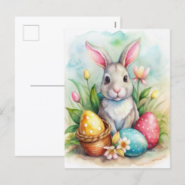 イースターのウサギと色付けされた卵のホリデーカード シーズンポストカード