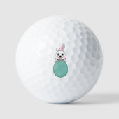 イースターエッグを持つかわいい白いバニー ゴルフボール (正面)