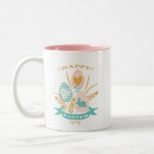 イースターシンボルブーケとハッピーイースター文字 ツートーンマグカップ (左)