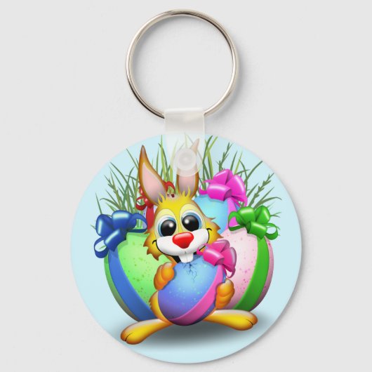 イースターバニーのかわいいキャラクターが卵をかじっている キーホルダー (正面)