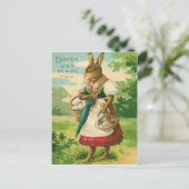 イースターバニーの女性バスケット色卵 シーズンポストカード (スタンド正面)