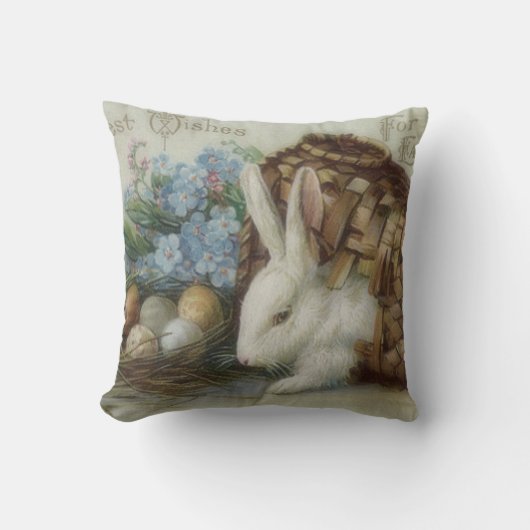 イースターバニ色彩の鮮やかーの色の卵の忘れバスケット クッション (正面)