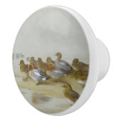 ウィゲオンとティール(緑がかった色)の水辺のアート セラミックノブ (右)