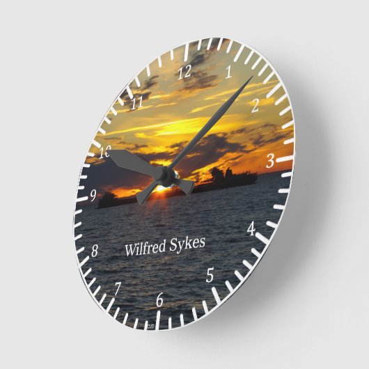 ウィルフレッド・サイクスの日没時計 ラウンド壁時計 (傾斜)