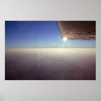 ウィング下のサンセット ポスター