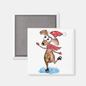 ウィンター・ワンダーランドのクリスマス犬のアイススケート マグネット (正面/裏面)