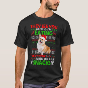 ウェルシュコーギーのサンタが食事中のお前を見てるよ Tシャツ