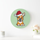 ウェルシュコーギー・ペンブロークの子犬がクリスマスのサンタ帽をかぶっている ラージ壁時計 (ホーム)