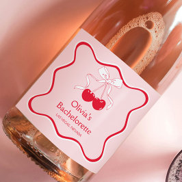 ウェーブがかった赤とピンクのチェリーオントップのバチェロレッテパーティー用シャンパンラベル スパークリングワインラベル
