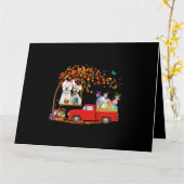 ウエスティーがウサギの耳を付けた赤いトラックと卵 カード (黄色い花)