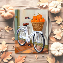 ウォーターカラーの秋の自転車のかごのカボチャ