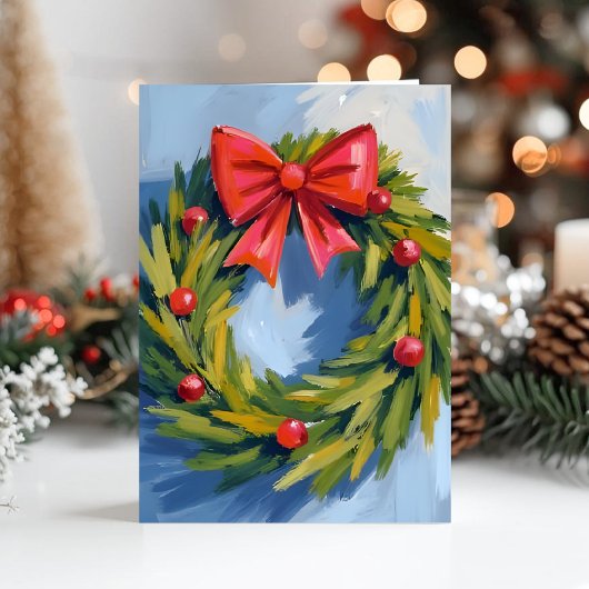 ウォーターカラーの赤いリボンのクリスマスリース シーズンカード