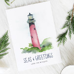 ウォーターカラーライトハウスフロリダビーチクリスマス シーズンカード<br><div class="desc">この沿岸テーマのクリスマスカードは私のオリジナルの手の水の色木星、フロリダのライトハウスの赤の色合いで鮮明な白い背景を特徴とする。海と挨拶の言葉はネイビーモダンブルーのブラシスクリプトタイポグラフィに設定されている。内側は青い色無地ので、白いあいさつカスタムが付いている。ハッピーホリデーや読地球の平和などの好きなように単語をパーソナライズしなさい。写真ではないビーチのクリスマスカードを見るにはZazzleのDoTellABelleを訪れる。アートワークとデザインバイビクトリアグリガリウナス</div>