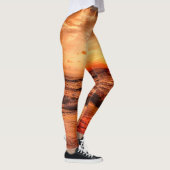 ウォームゴールデンオレンジサンセットオーバー海 レギンス (右)
