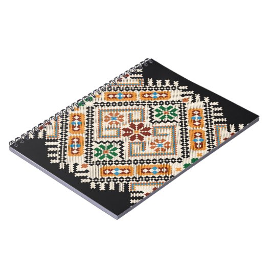 ウクライナのクロスステッチ:民族手作りパターン。 ノートブック (左側)