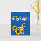 ウクライナクレーンとヒマワリのブルーグリーティングのための平和 カード (黄色い花)