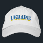 ウクライナブルーとイエローステンシルスタイルフォント白 刺繍入りキャップ<br><div class="desc">UKRAINE Colors Blue and Yellow Stencilスタイル白い綿帽子に刺繍フォントウクライナへの支持を示す！</div>