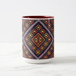 ウクライナ人のVyshyvankaの刺繍のオレンジ太陽のマグ ツートーンマグカップ
