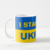 ウクライナ国旗と共に立つ コーヒーマグカップ (左)