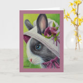 ウサギの愛らしい姿をとらえた、帽子をかぶったブラック・ホワイトのオランダウサギの水彩画 カード (黄色い花)