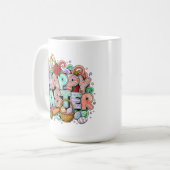 ウサギの耳と花で飾られたイースターアート コーヒーマグカップ (正面左)
