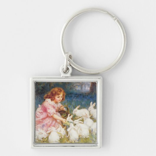 ウサギを食べ物を与えること キーホルダー (正面)